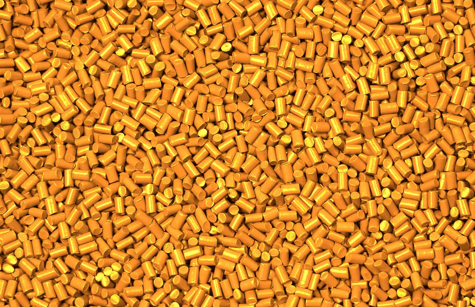 Close view of bright orange color concentrate pellets