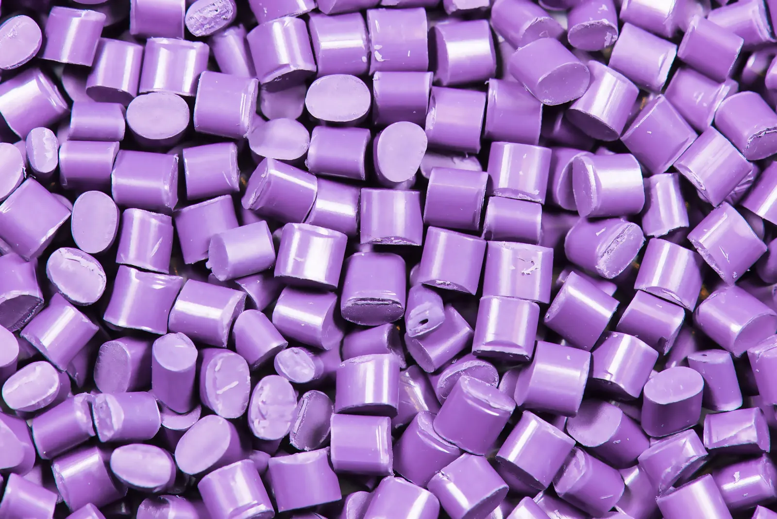 Close view of violet color concentrate pellets