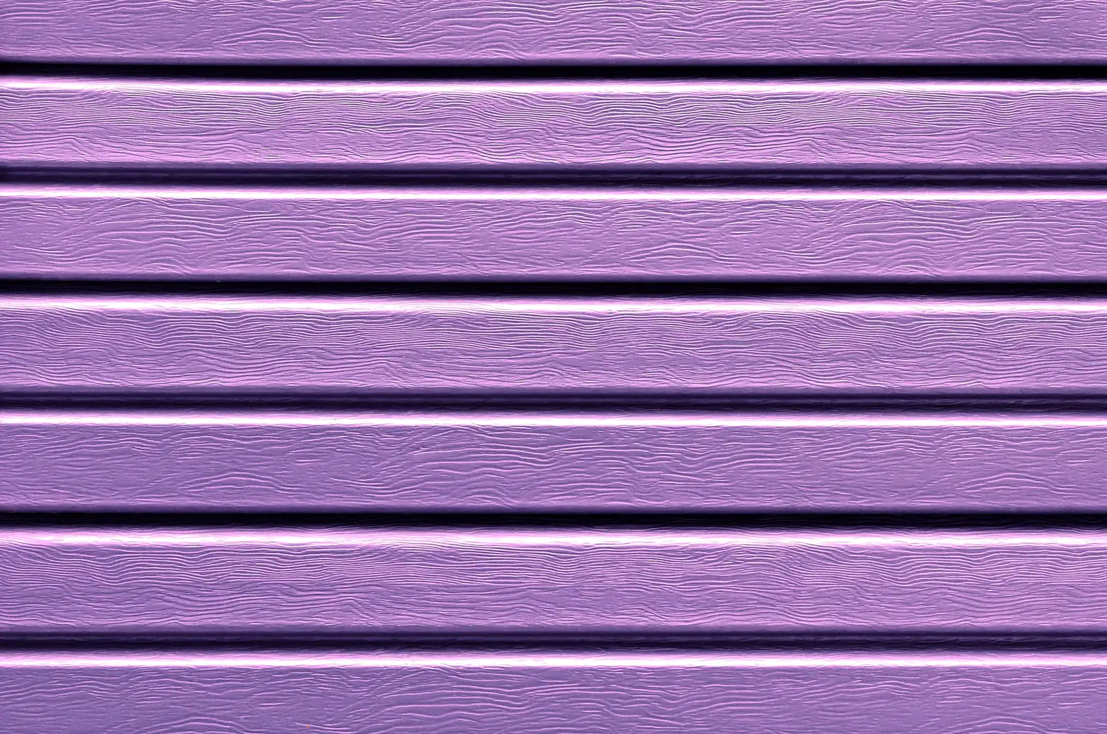 Extruded violet plastic profiles running in parallel